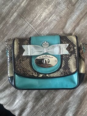 My Flat in London Teal and Snake-Print Crossbody with Silver Bow